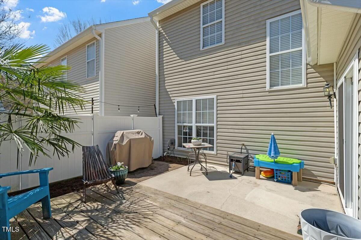 1104 Garnet Ridge Way Raleigh, NC 27607 - Photo 2 of 20 a building outdoor space with patio furniture