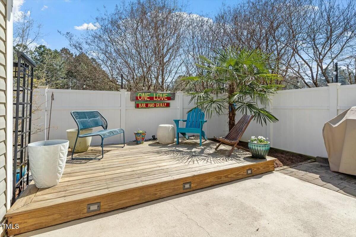 1104 Garnet Ridge Way Raleigh, NC 27607 - Photo 3 of 20 a view of a outdoor space with garden and patio