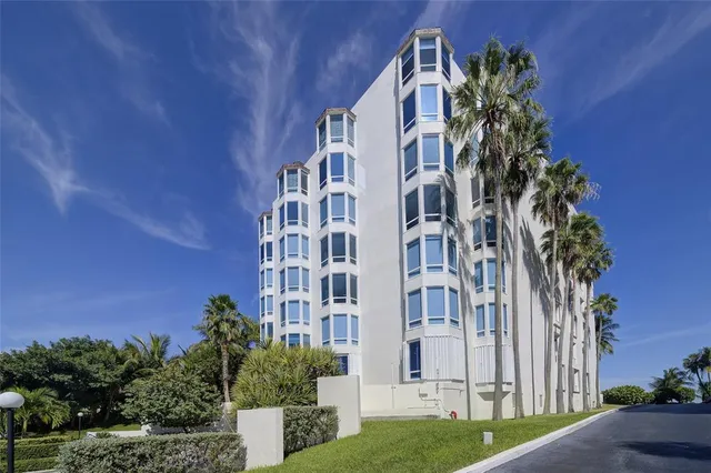 front view of a building with a yard