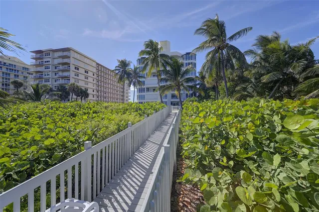 a view of a lake and a yard