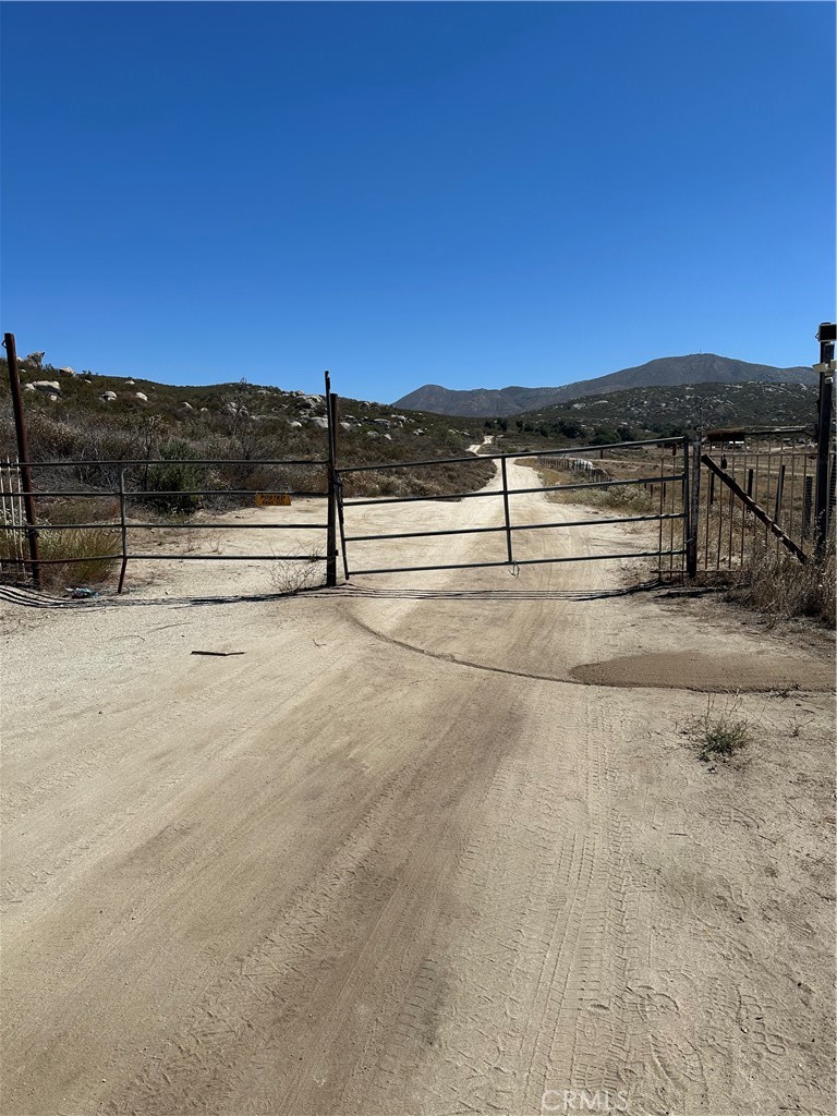 1718 Milpas Road Hemet, CA 92544 - Photo 2 of 18 Gate on Benton Road before you get to the parcel.