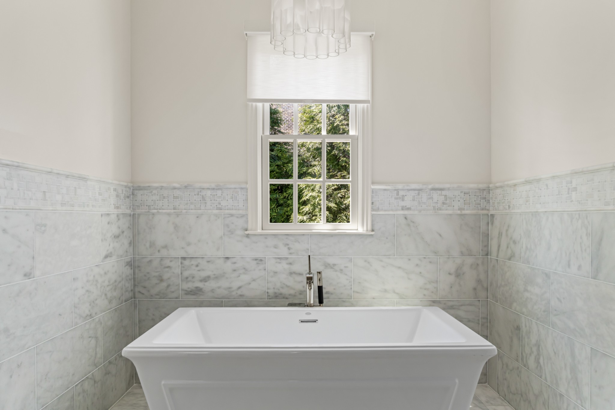 5053 Native Pony Trail College Grove, TN 37046 - Photo 27 of 66 a bathroom with a bathtub and window