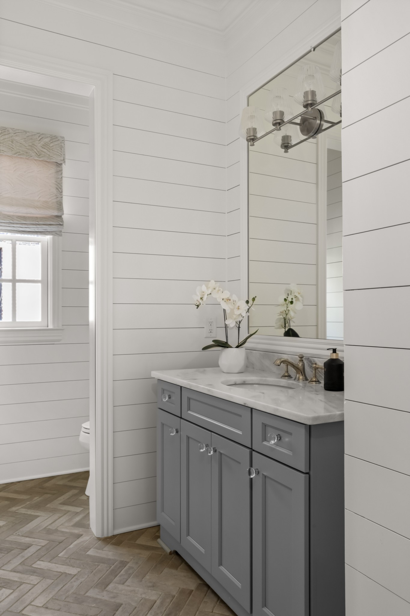 5053 Native Pony Trail College Grove, TN 37046 - Photo 34 of 66 a bathroom with a granite countertop sink and a mirror