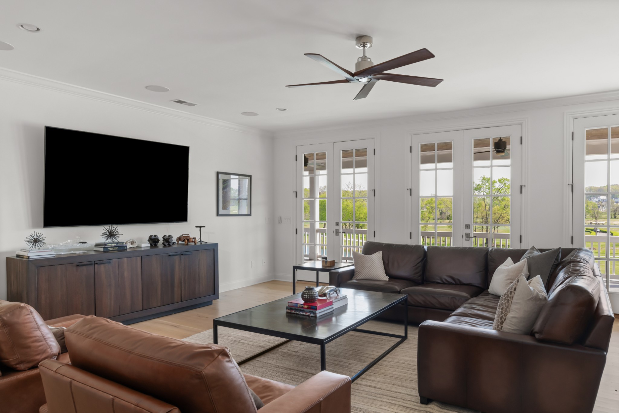 5053 Native Pony Trail College Grove, TN 37046 - Photo 39 of 66 a living room with furniture and a flat screen tv