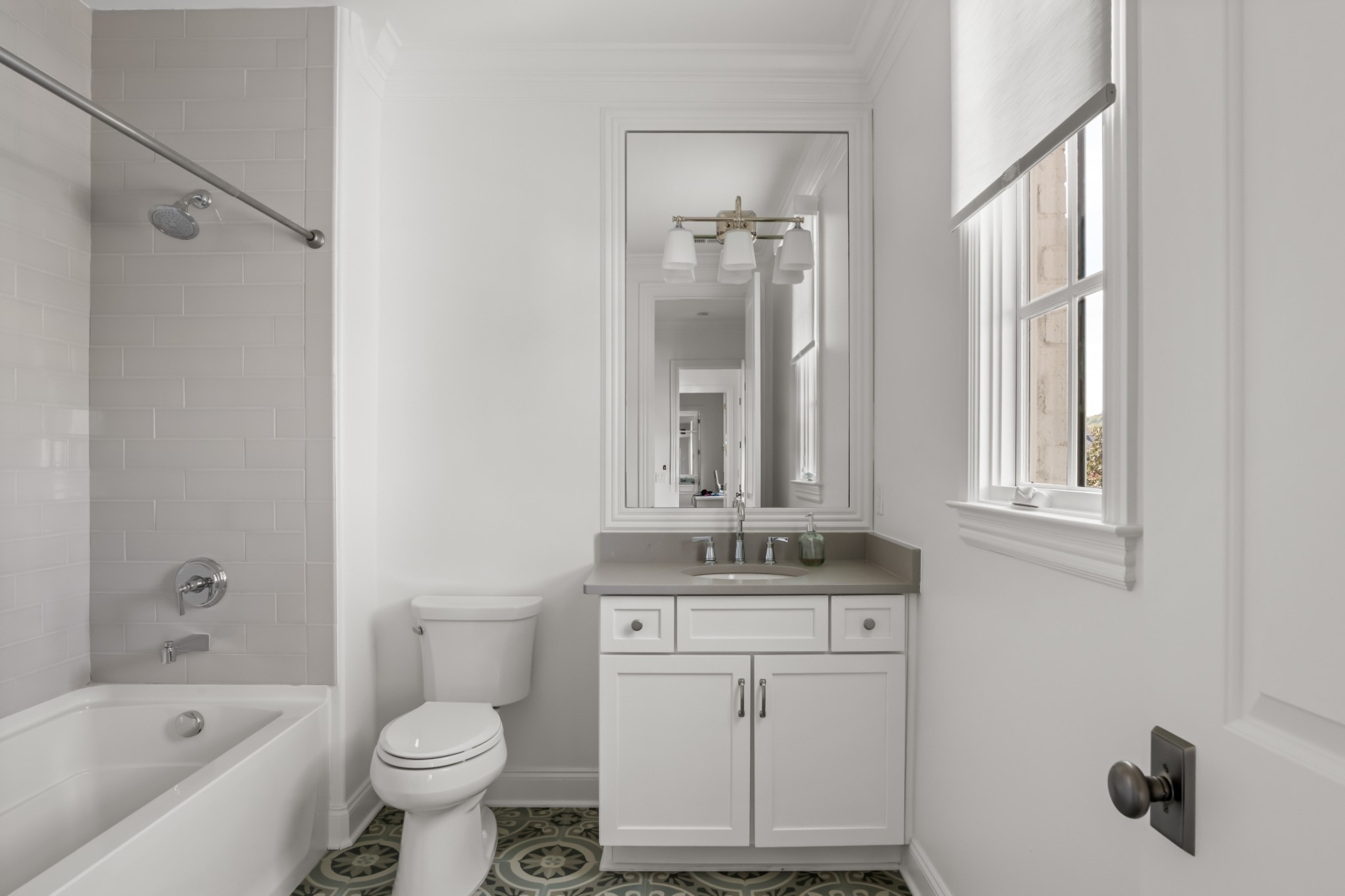 5053 Native Pony Trail College Grove, TN 37046 - Photo 46 of 66 a bathroom with a sink toilet a shower and bathtub