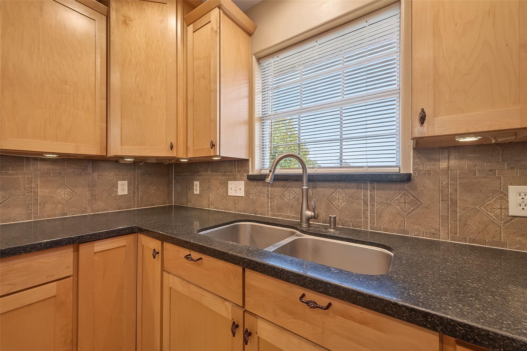 12415 Roesler Road Needville, TX 77461 - Photo 13 of 46 a kitchen with stainless steel appliances granite countertop a sink and a white cabinets