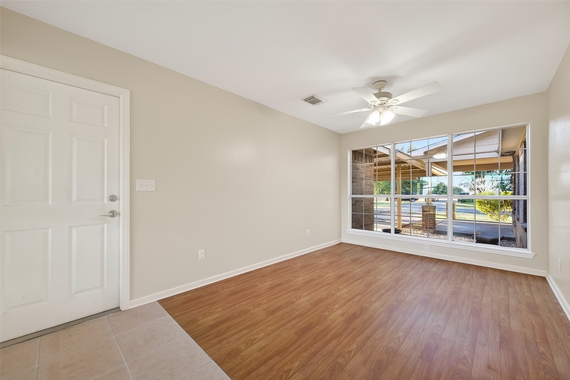 12415 Roesler Road Needville, TX 77461 - Photo 18 of 49 wooden floor in an empty room with a window
