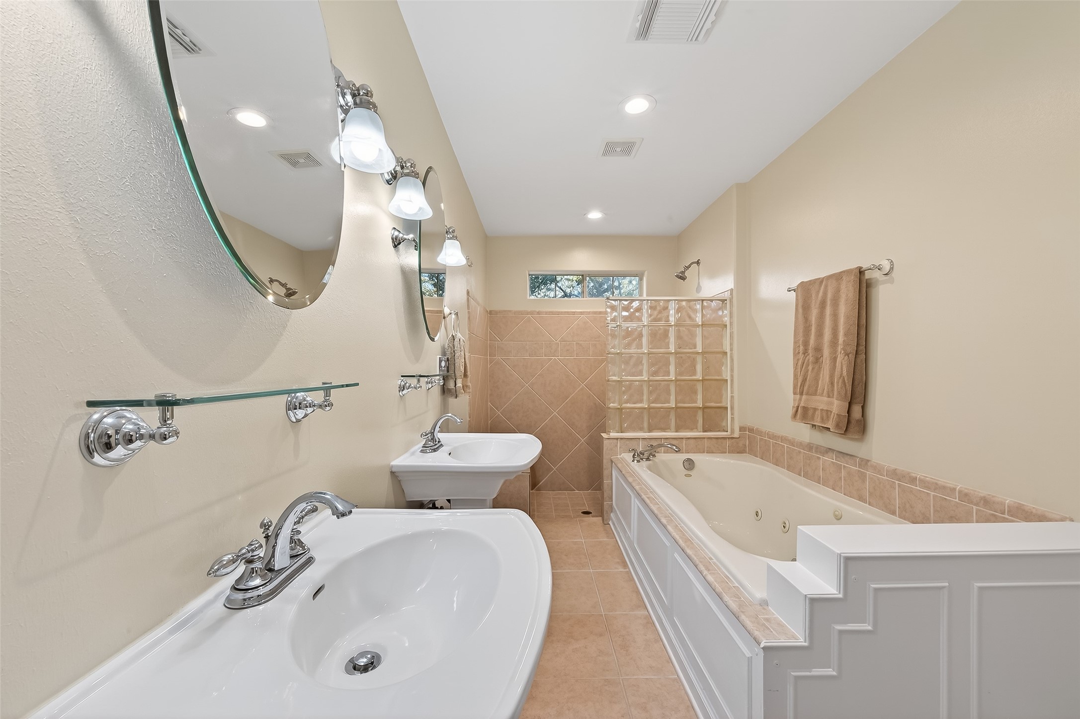 12415 Roesler Road Needville, TX 77461 - Photo 30 of 46 a bathroom with a tub sink and mirror