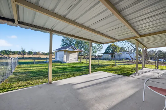 a view of a porch with a backyard