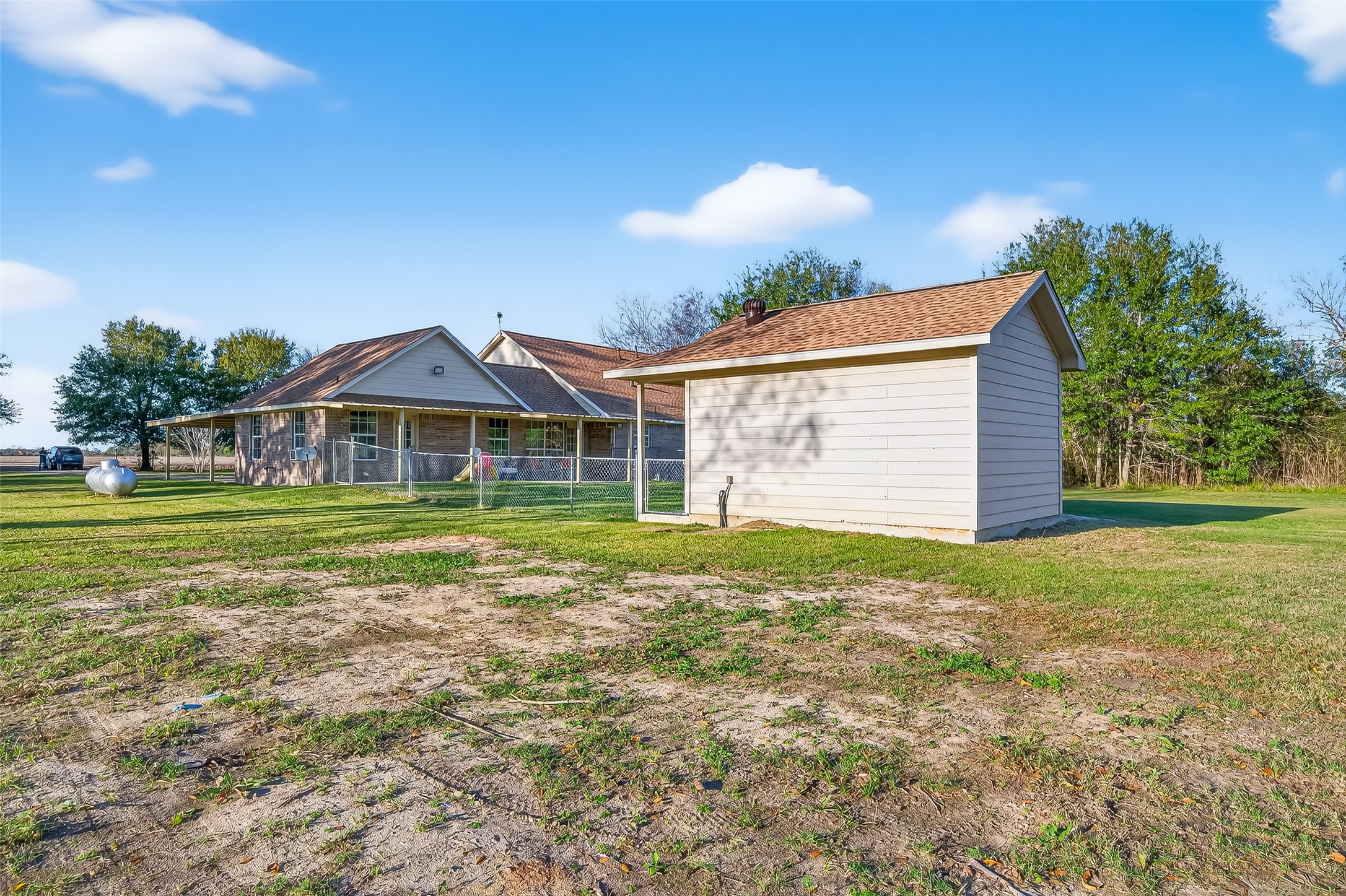 12415 Roesler Road Needville, TX 77461 - Photo 39 of 46 a view of a house with a yard