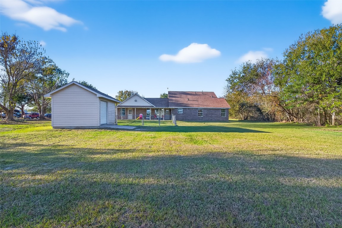 12415 Roesler Road Needville, TX 77461 - Photo 40 of 49 Rear Exterior & Shop