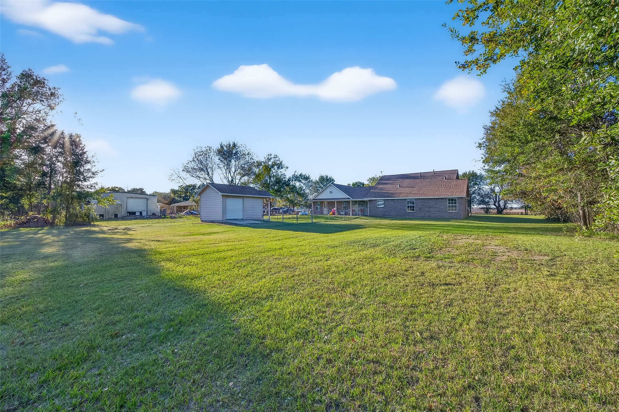 12415 Roesler Road Needville, TX 77461 - Photo 41 of 46 a view of an house with a yard