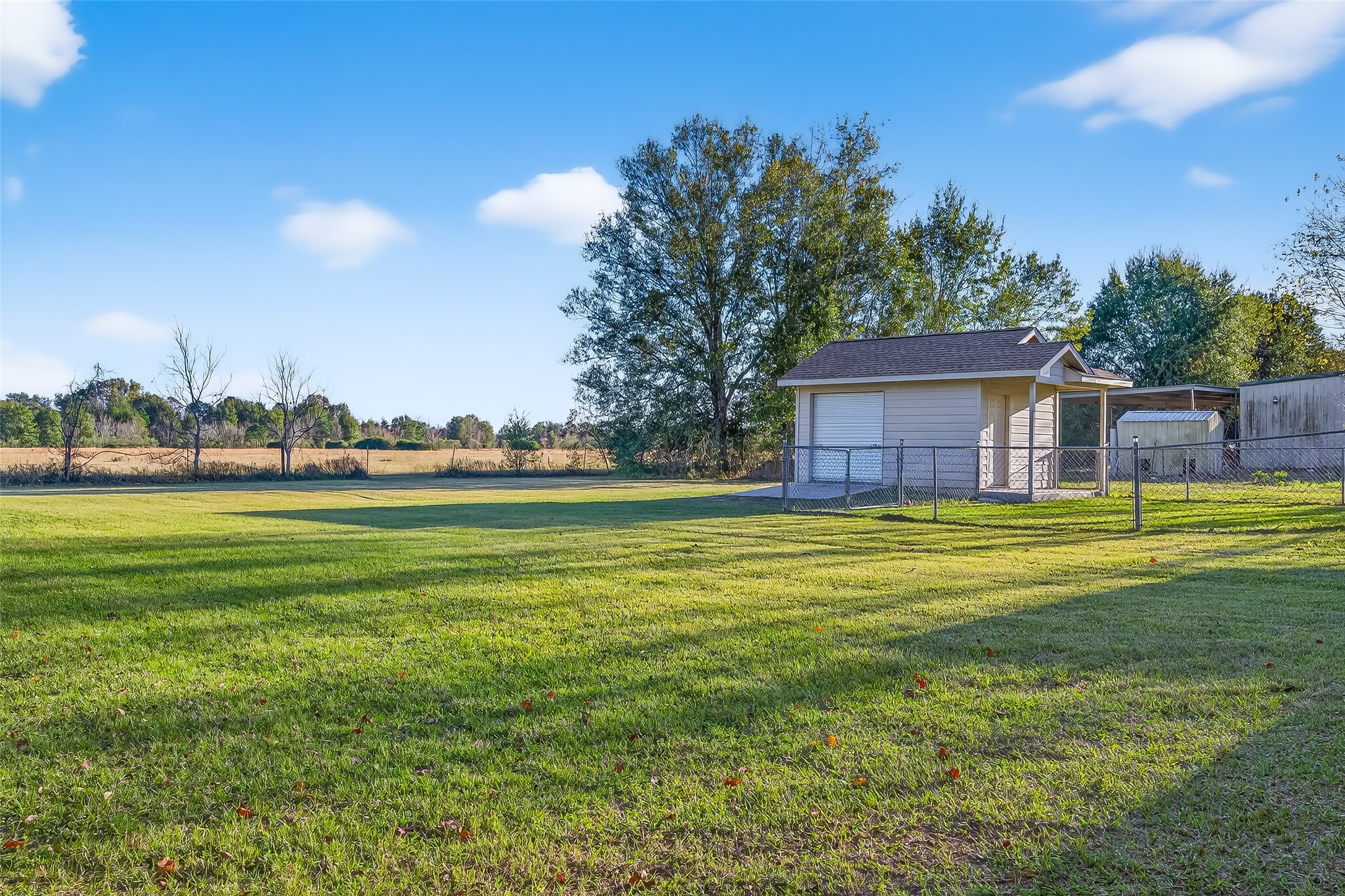 12415 Roesler Road Needville, TX 77461 - Photo 44 of 46 a house view with swimming pool in front of it