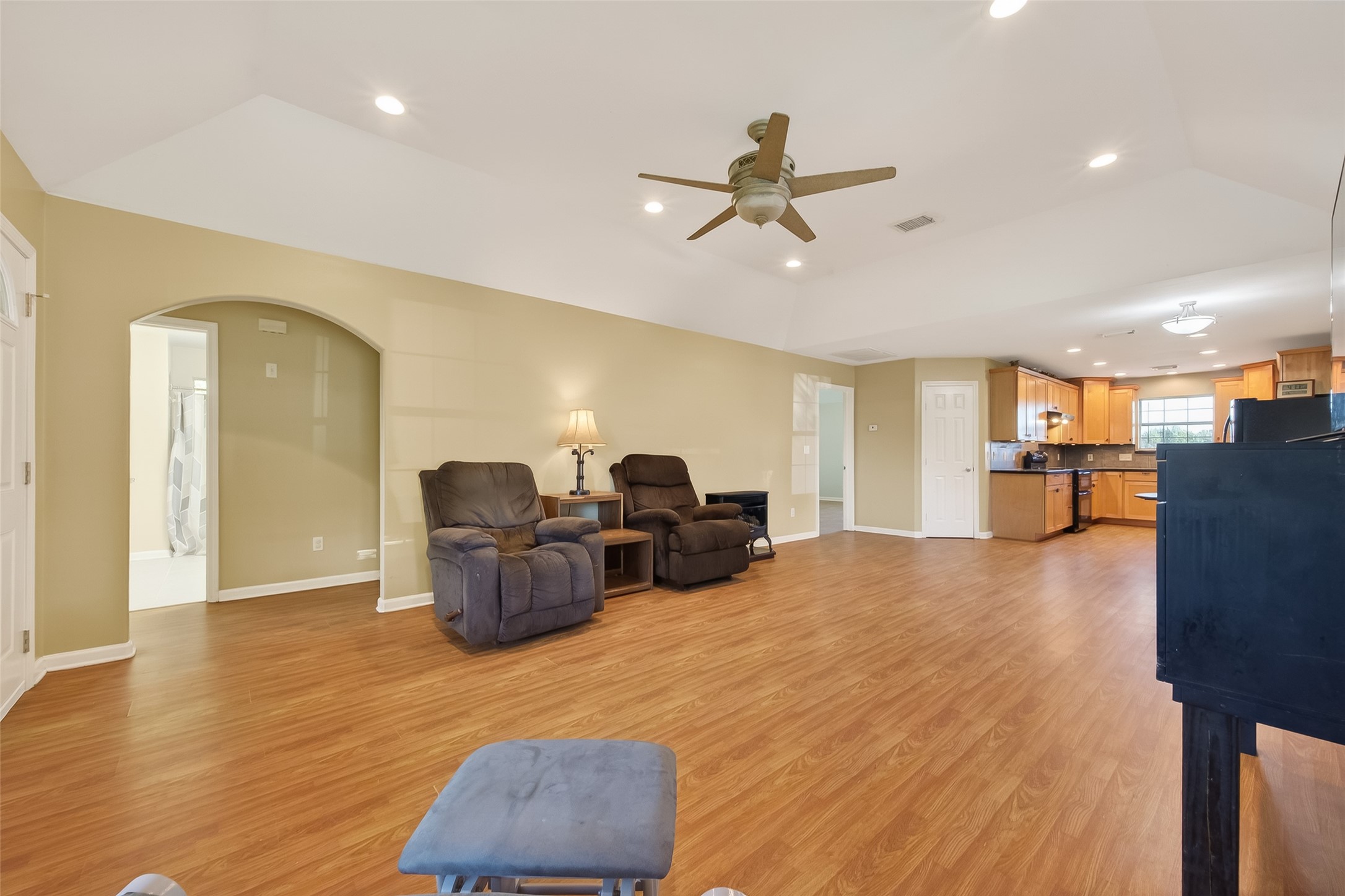12415 Roesler Road Needville, TX 77461 - Photo 8 of 46 a living room with furniture and kitchen view with wooden floor