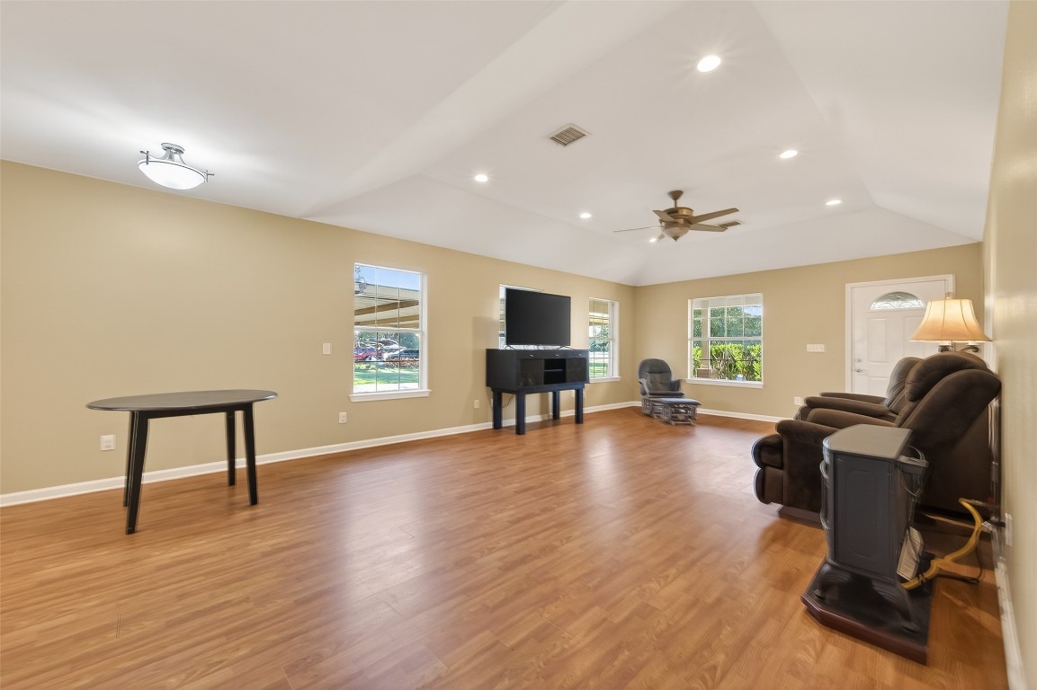 12415 Roesler Road Needville, TX 77461 - Photo 9 of 49 a living room with furniture and a wooden floor