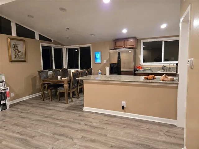 a room with furniture and a large window