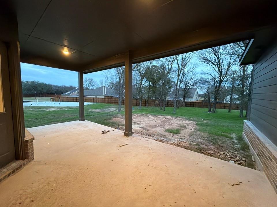 1132 Trinity Drive Springtown, TX 76082 - Photo 9 of 11 a view of a house with backyard and a garden