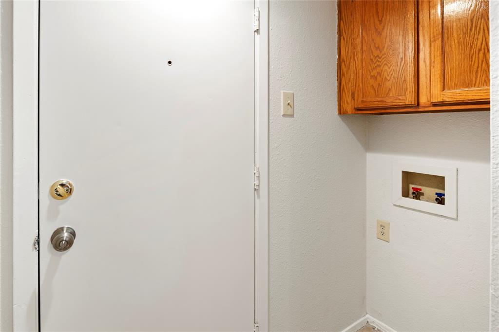 7591 Tournament Road Frisco, TX 75035 - Photo 14 of 26 a bathroom with a granite countertop shower and a window