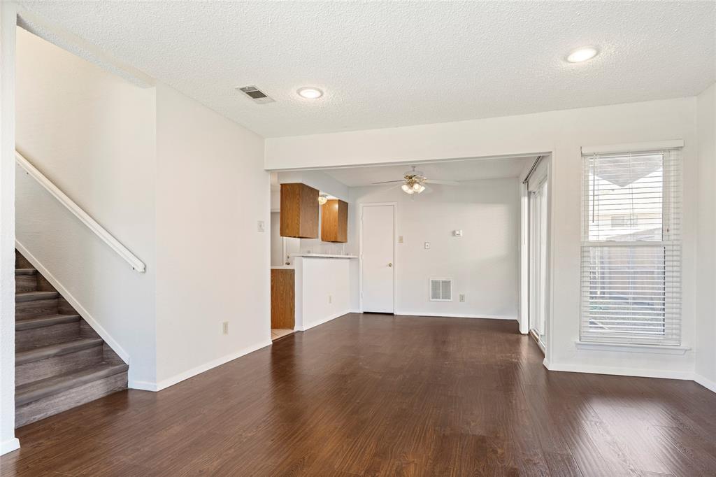 7591 Tournament Road Frisco, TX 75035 - Photo 6 of 26 wooden floor in an empty room with a window