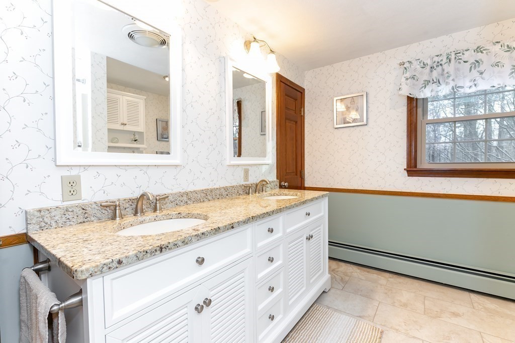 1920 Maple Street Dighton, MA 02764 - Photo 29 of 42 a bathroom with a granite countertop sink and a mirror