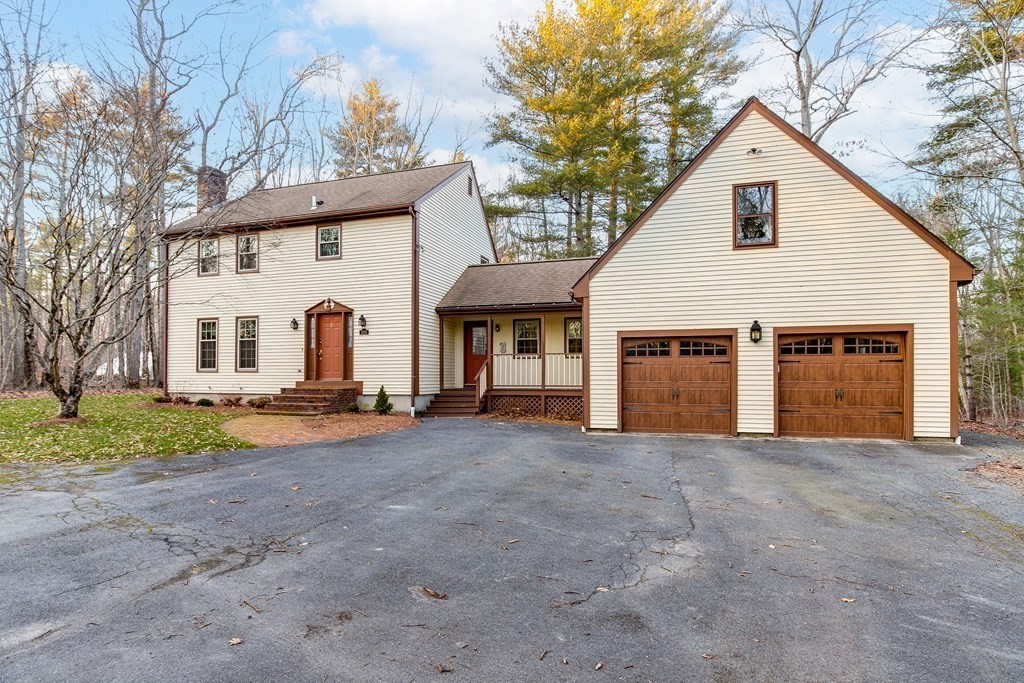 1920 Maple Street Dighton, MA 02764 - Photo 3 of 42 a view of a house with a yard and large tree
