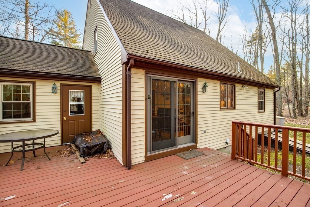 1920 Maple Street Dighton, MA 02764 - Photo 33 of 42 a view of a house with a wooden bench