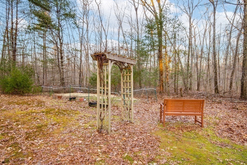 1920 Maple Street Dighton, MA 02764 - Photo 38 of 42 a backyard of a house with table and chairs
