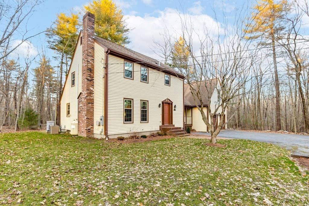 1920 Maple Street Dighton, MA 02764 - Photo 4 of 42 a view of a house with a yard