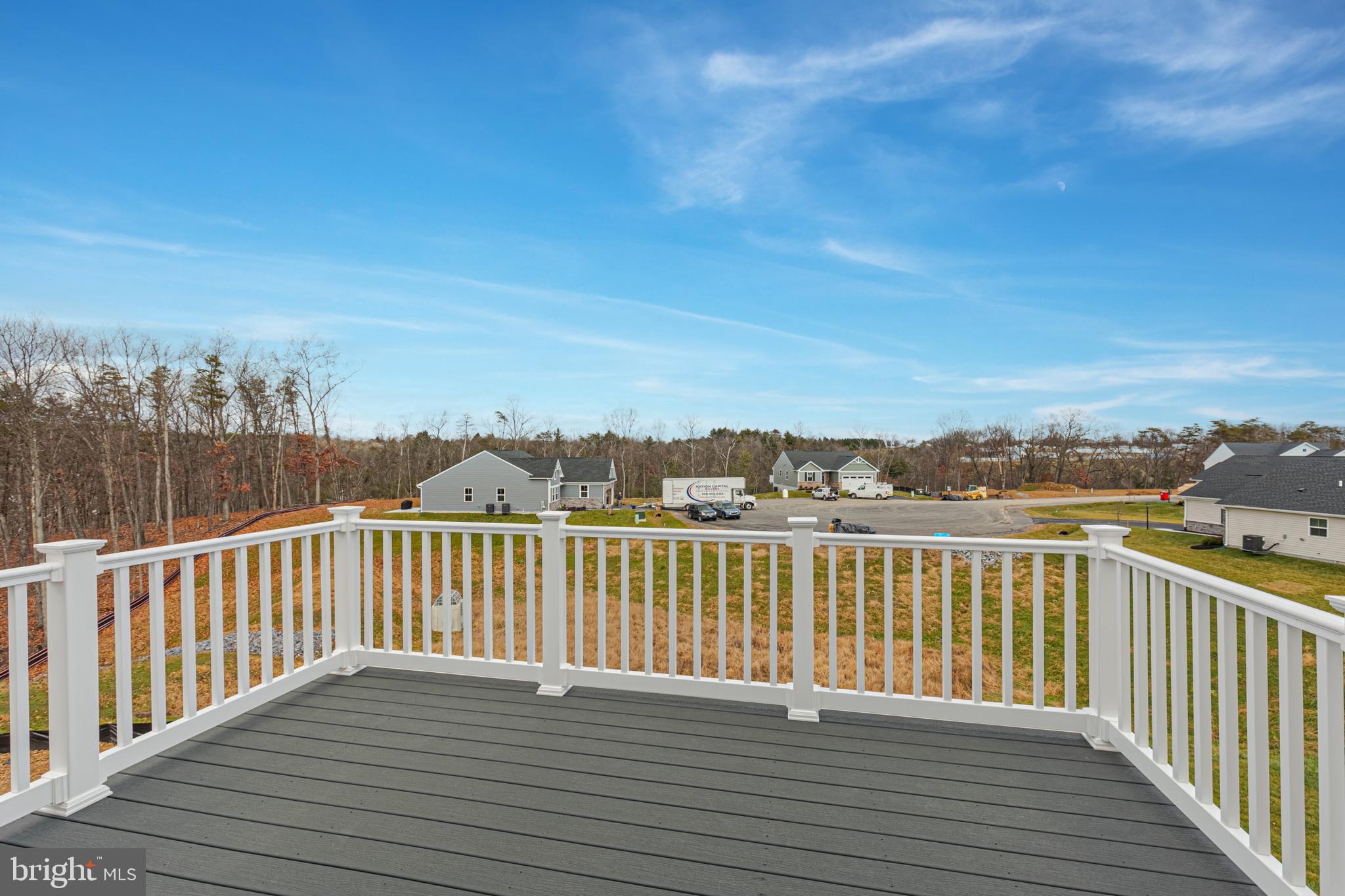 90 Tilapia Road Inwood, WV 25428 - Photo 17 of 34 Rear Trex Deck