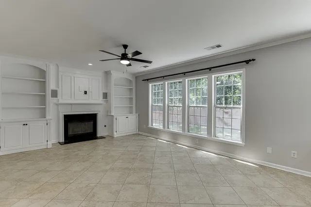 a kitchen with stainless steel appliances granite countertop a stove top oven and sink