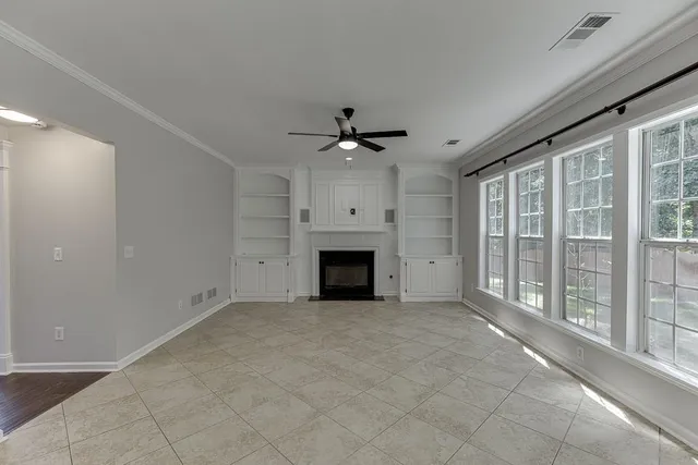 a kitchen with stainless steel appliances a stove sink and cabinets