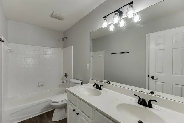 an aerial view of a house with a garden