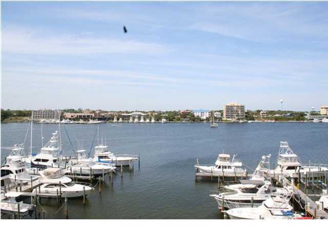 211 Durango Road, Unit 415 Destin, FL 32541 - Photo 4 of 12 a terrace with outdoor seating city view and barbeque oven