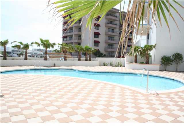 211 Durango Road, Unit 415 Destin, FL 32541 - Photo 10 of 12 a view of a building with a swimming pool