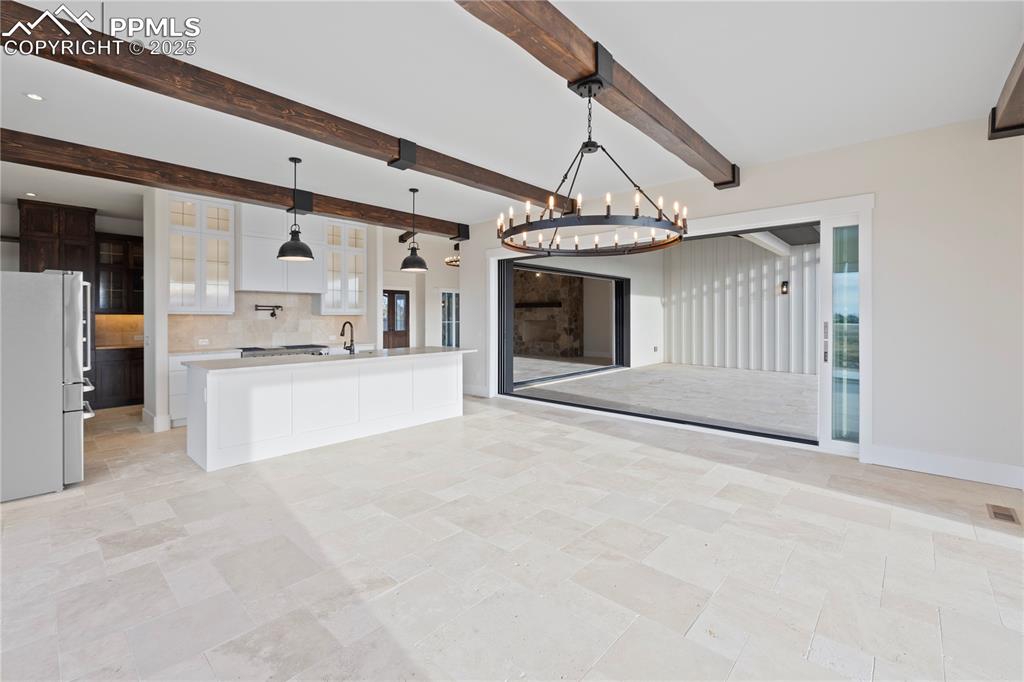 16864 Horizon Ridge Trail Colorado Springs, CO 80908 - Photo 20 of 47 a view of a kitchen with stainless steel appliances granite countertop a sink and cabinets