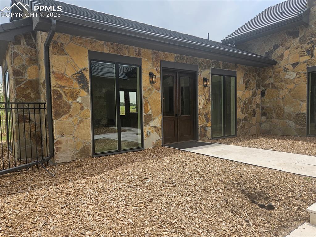 16864 Horizon Ridge Trail Colorado Springs, CO 80908 - Photo 4 of 47 a view of backyard with door