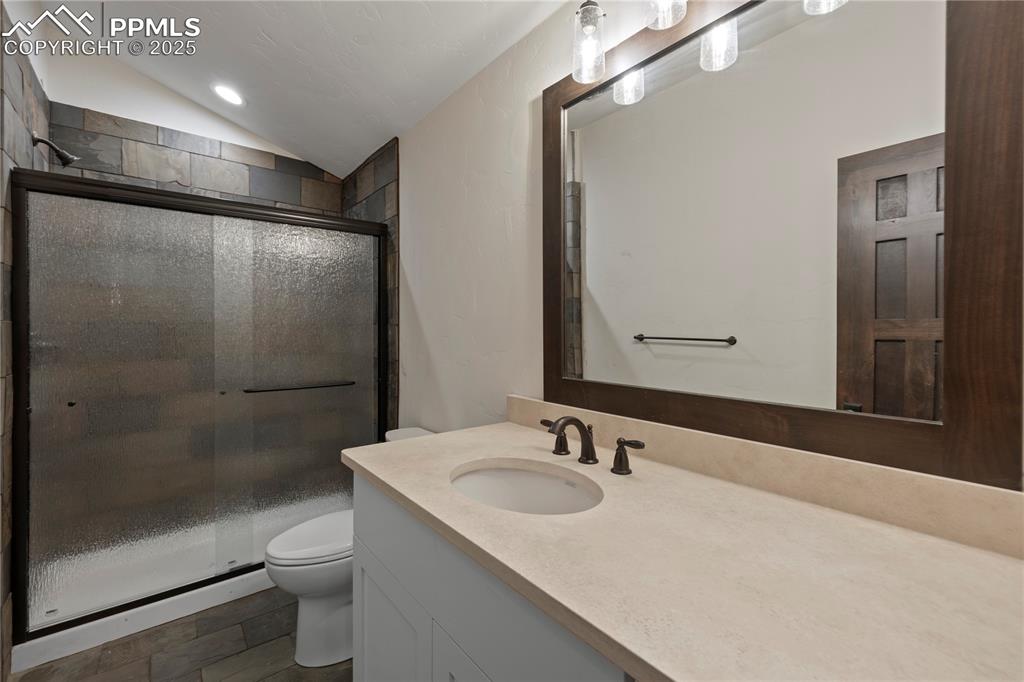 16864 Horizon Ridge Trail Colorado Springs, CO 80908 - Photo 45 of 47 a bathroom with a sink toilet and shower