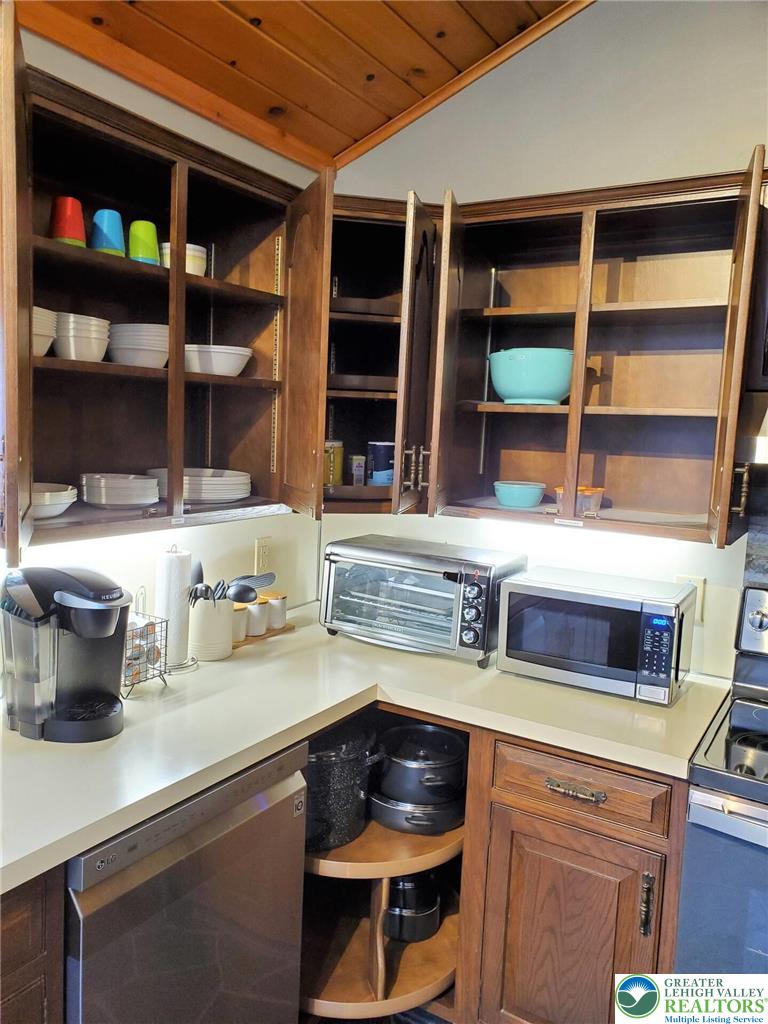 1271 Kilmer Road Tobyhanna, PA 18466 - Photo 11 of 45 a kitchen with a stove and a wooden cabinets