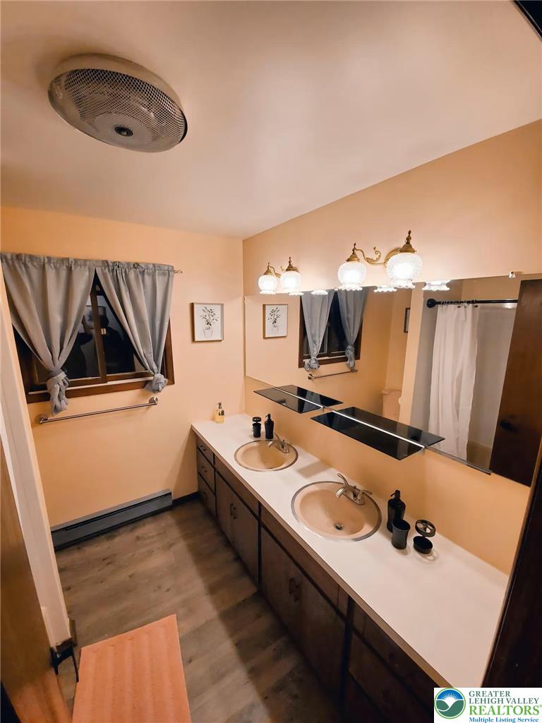 1271 Kilmer Road Tobyhanna, PA 18466 - Photo 18 of 45 a bathroom with a sink and a mirror