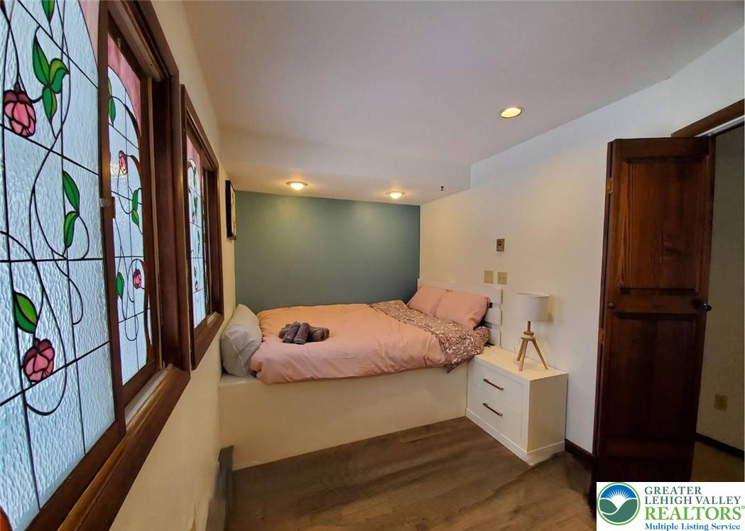 1271 Kilmer Road Tobyhanna, PA 18466 - Photo 19 of 45 a bedroom with a bed and a window