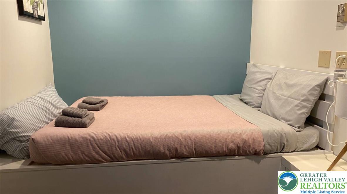 1271 Kilmer Road Tobyhanna, PA 18466 - Photo 20 of 45 a bedroom with a bed and window