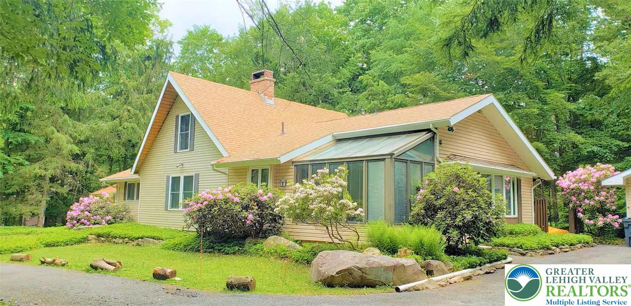 1271 Kilmer Road Tobyhanna, PA 18466 - Photo 2 of 45 a view of a house with a yard and potted plants