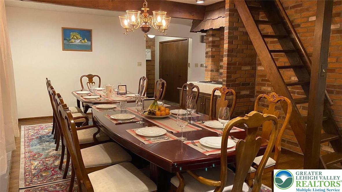 1271 Kilmer Road Tobyhanna, PA 18466 - Photo 8 of 45 a view of a dining room with furniture and chandelier