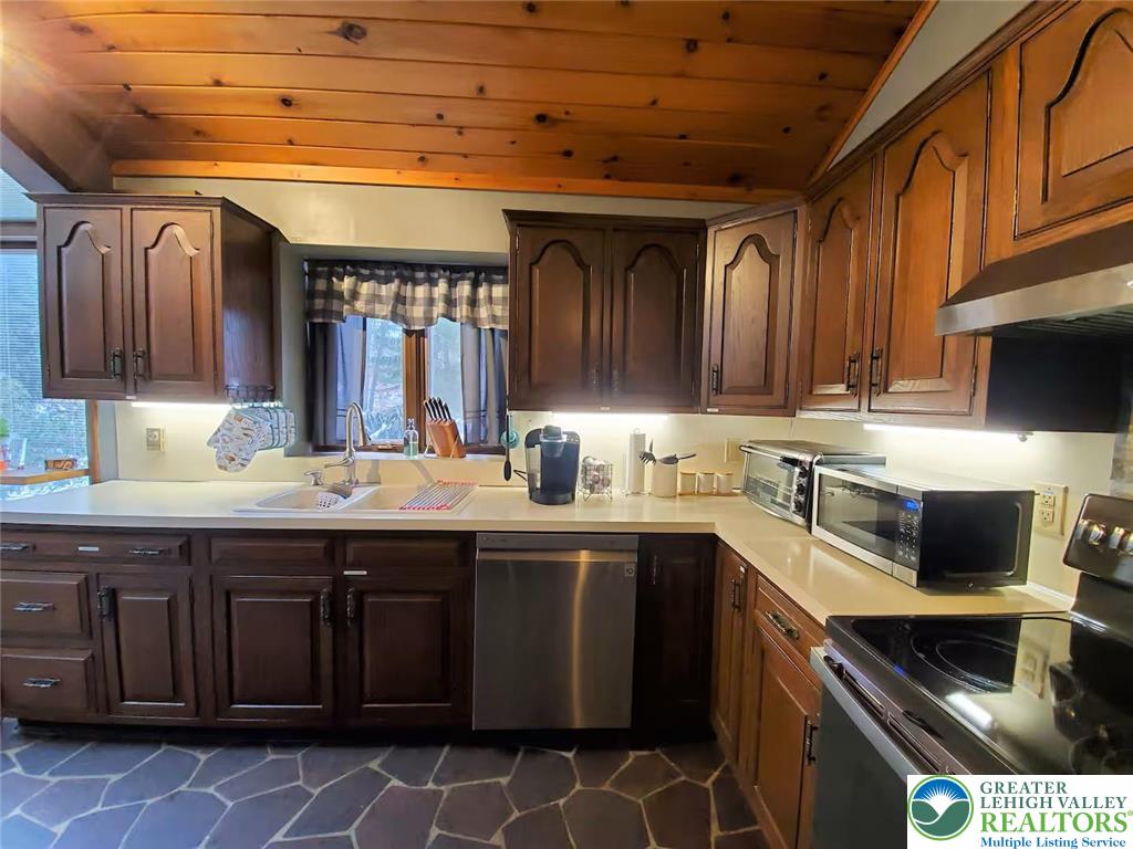 1271 Kilmer Road Tobyhanna, PA 18466 - Photo 9 of 45 a kitchen with a sink and cabinets