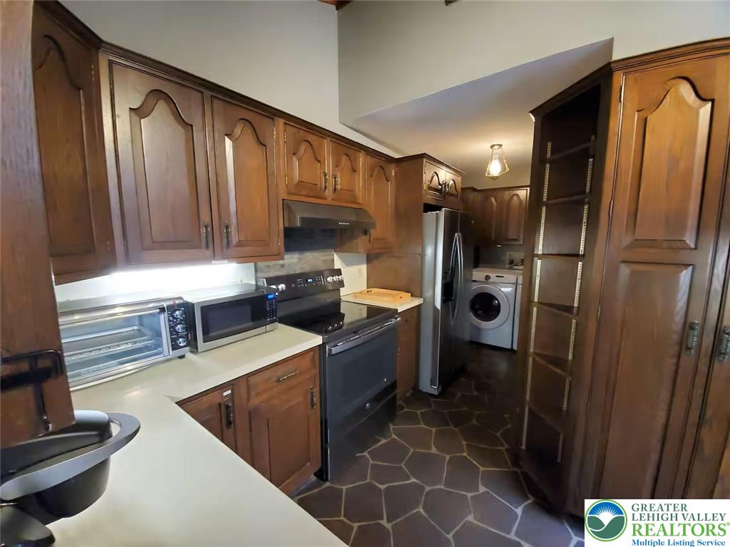 1271 Kilmer Road Tobyhanna, PA 18466 - Photo 10 of 45 a kitchen with a refrigerator and a sink
