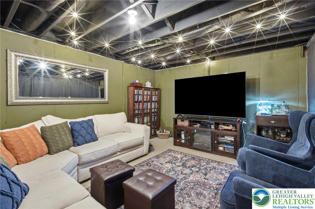 890 Lahr Road Nazareth, PA 18064 - Photo 35 of 71 A versatile finished basement room provides comfortable entertainment space.