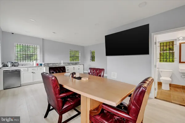 a view of a dining room with furniture