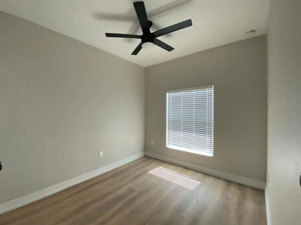 10524 Pendleton Avenue Englewood, FL 34224 - Photo 7 of 12 a view of an empty room with a window