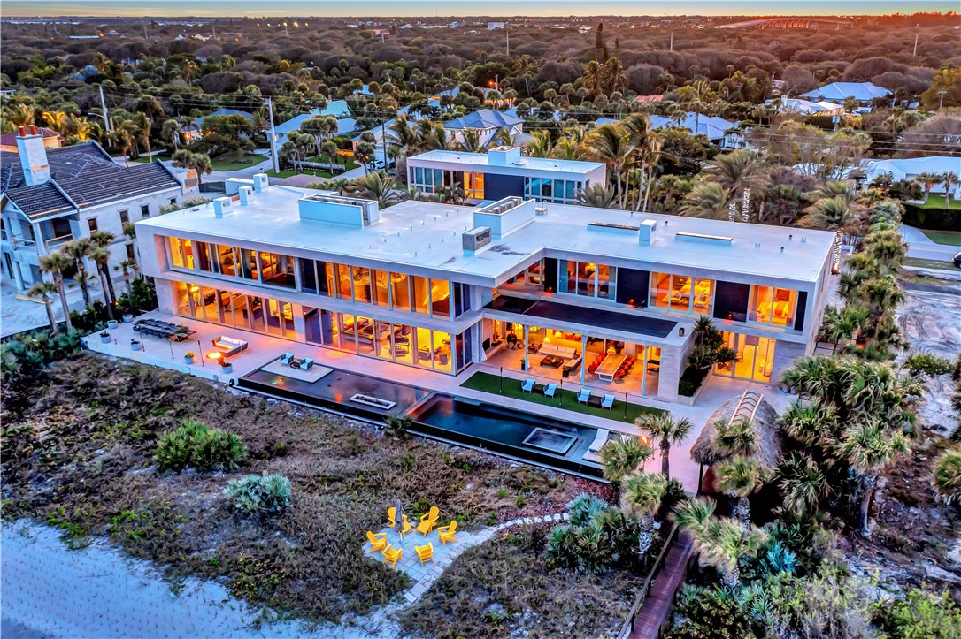 3700 Ocean Drive Vero Beach, FL 32963 - Photo 36 of 36 an aerial view of a houses with swimming pool