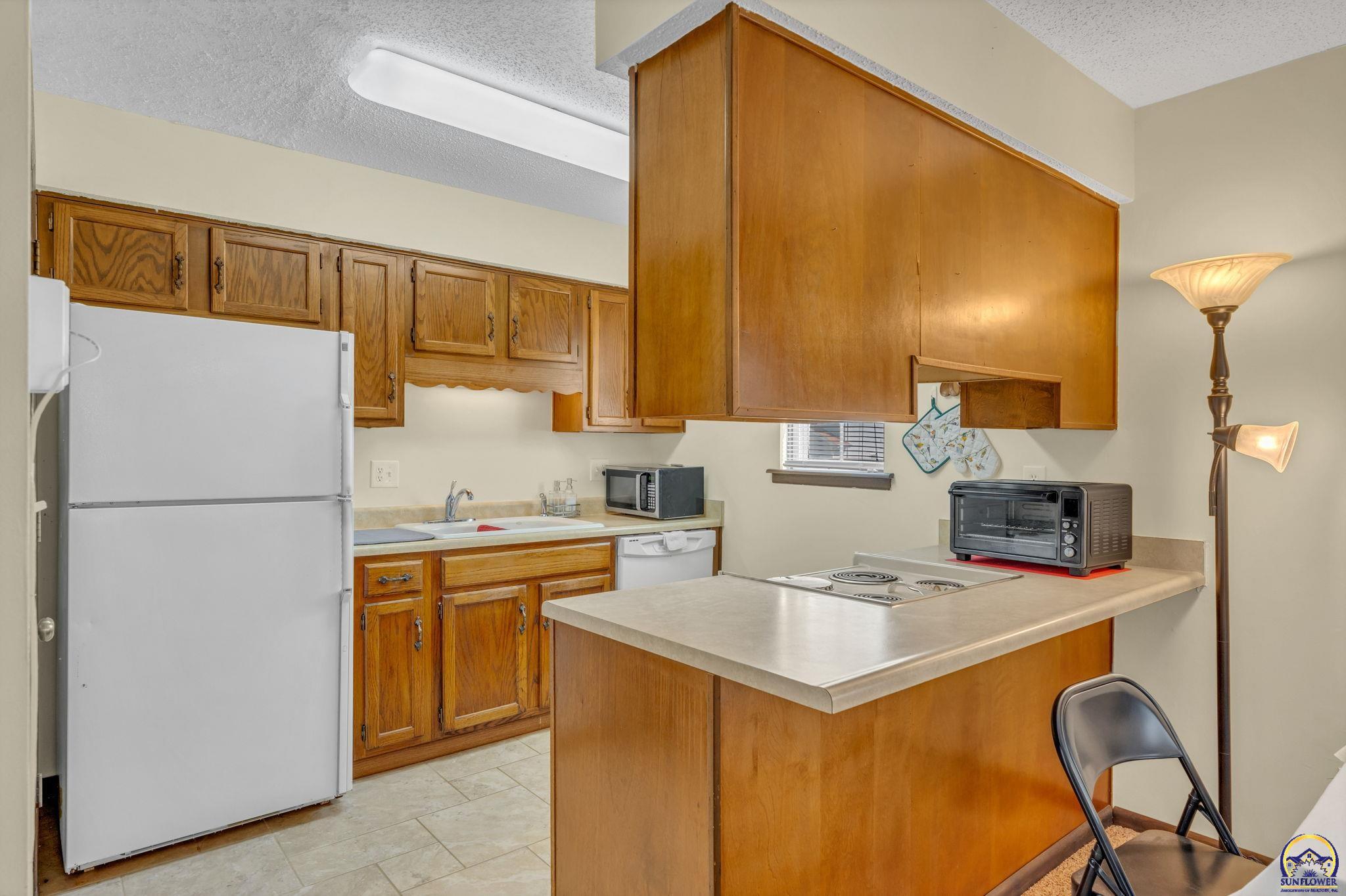 5853 Southwest 22nd Terrace Topeka, KS 66614 - Photo 5 of 12